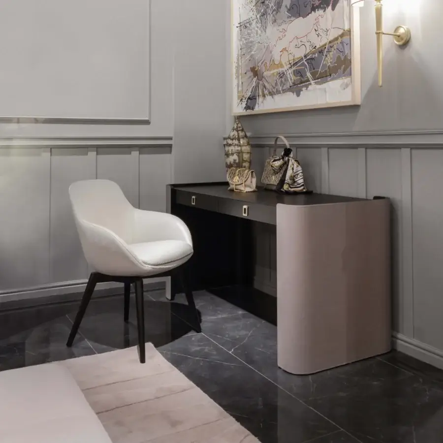 Elegant Formitalia Downtown armchair upholstered in smooth white fabric or leather with sleek dark wood veneer legs