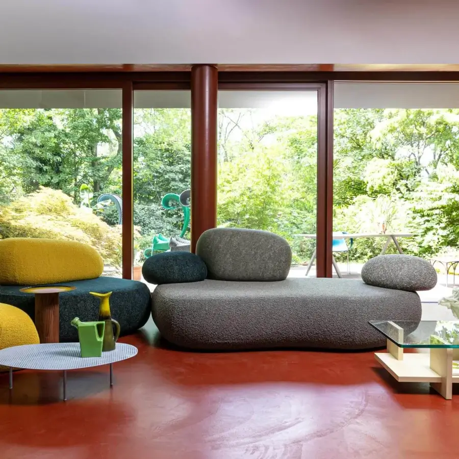 Distinguished Moroso Pebble Rubble sofa crafted in Italy with textured gray fabric and polyurethane foam volumes offering welcoming seating