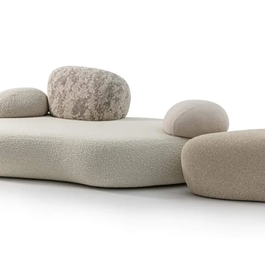 Innovative Moroso Pebble Rubble sofa upholstered in creamy off-white boucle-like fabric with organic silhouettes