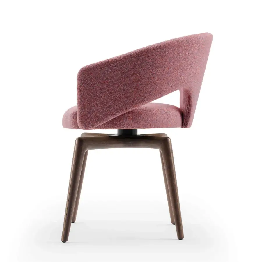 Superior Turri Blues armchair unites backrest and armrest in a sinuous gesture with reddish-pink textured textile and dark brown wood base