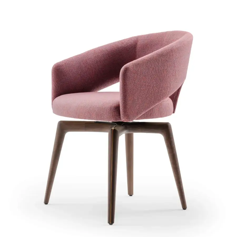 Lavish Turri Blues armchair exhibits a sculptural form with rose-red textile upholstery and a dark wood base
