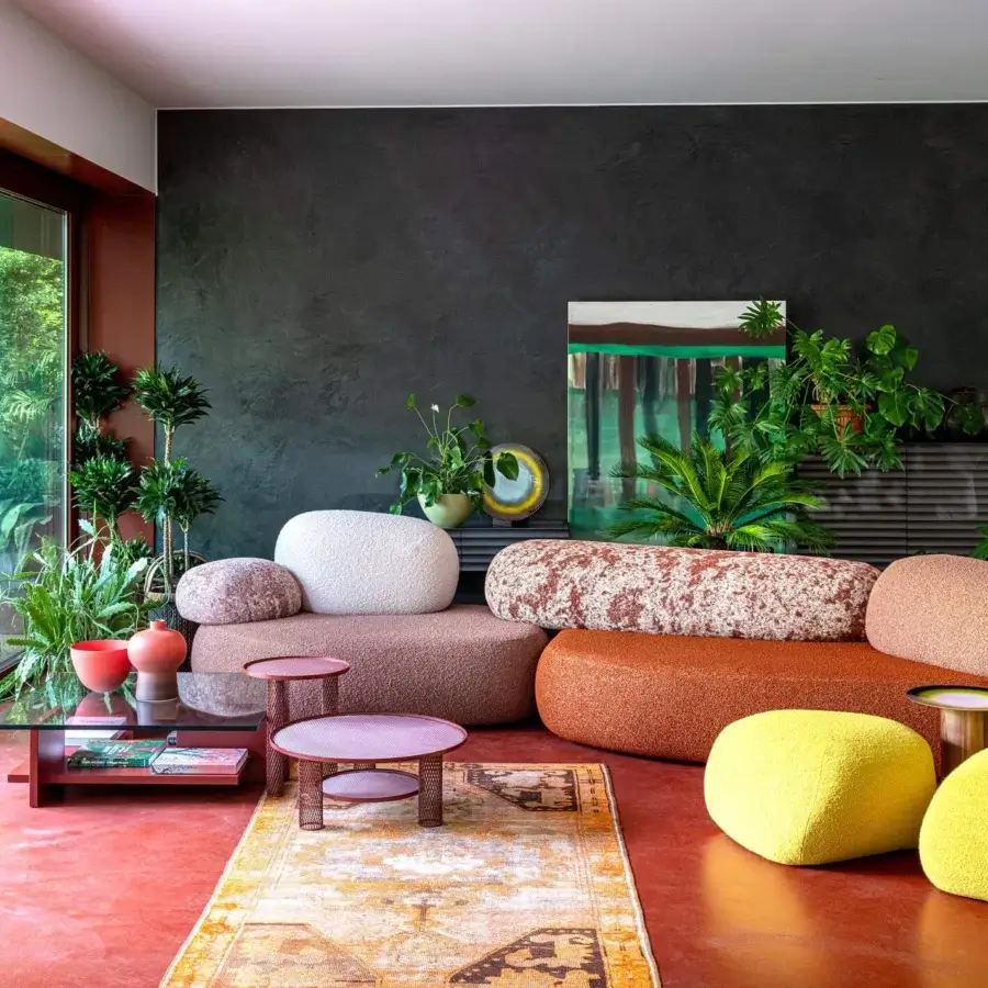 Superior Moroso Pebble Rubble sectional with rounded geometric forms upholstered in textured brown, orange, beige, cream and yellow textiles crafted in Italy