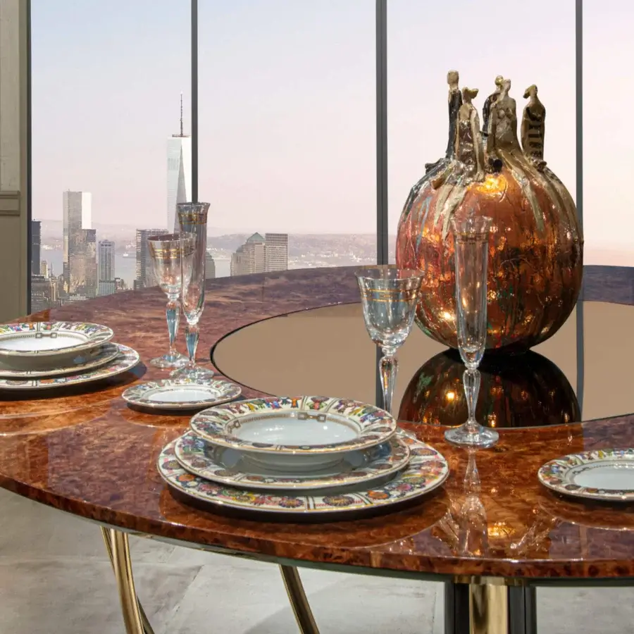 Lavish Formitalia Dome table with varying shades of brown wood veneer and metallic gold lacquered base