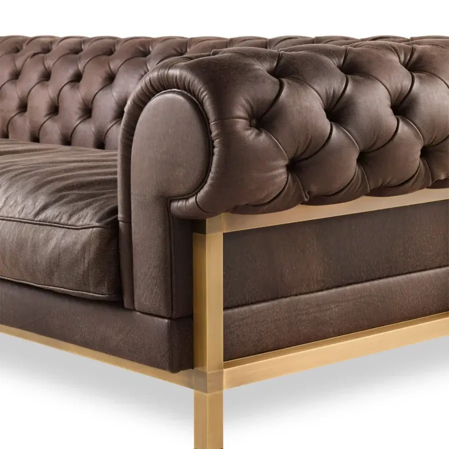 Refined Bellavista My Chester Tuft sofa in dark brown leather with matte finish and sleek brass base
