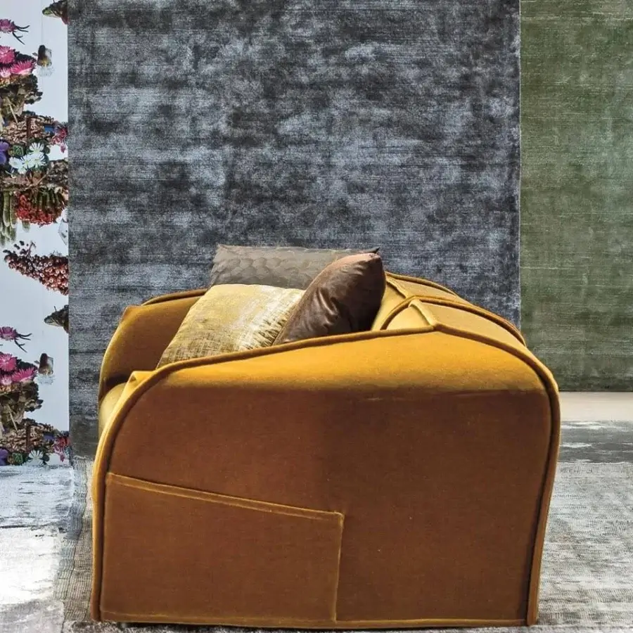 Exceptional Moroso M.a.s.s.a.s sofa with geometric form and muted ochre textile upholstery, built with a steel frame and side pocket detail