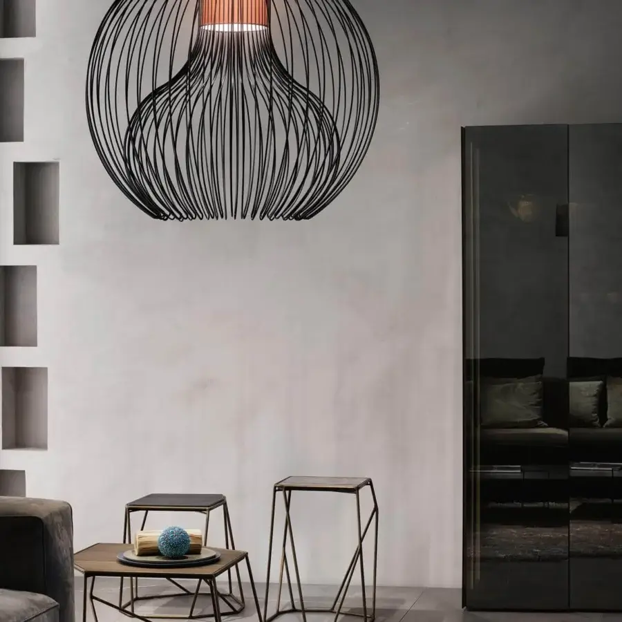 Captivating Modo Luce Icaro Ball suspension lamp with a spherical silhouette crafted in painted steel wire and vibrant orange stripe diffuser with matte finish