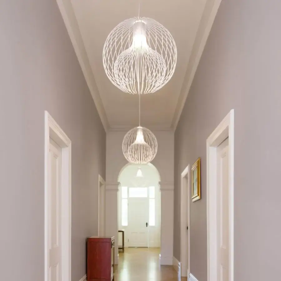 Superior Modo Luce Icaro Ball suspension lamp with a spherical body in painted steel wire and matte white finish