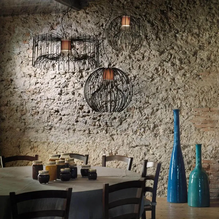 Superior Modo Luce Icaro Ball suspension lamp with a spherical cage crafted in painted steel wire and matte finish