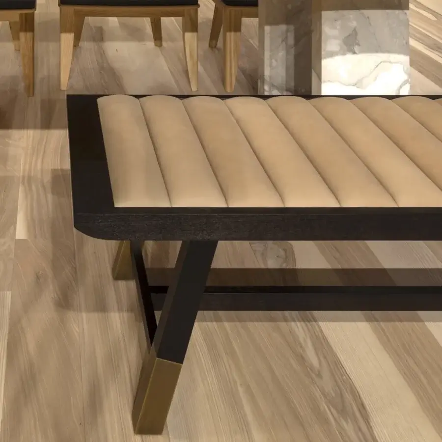 Distinguished Bellavista Attila bench with solid ashwood structure, brass feet and light tan textile upholstery featuring vertical channeling