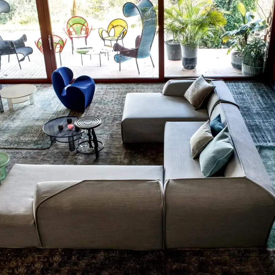 Elegant Moroso M.a.s.s.a.s sectional with light gray woven textile upholstery, modular design and subtle stitching details