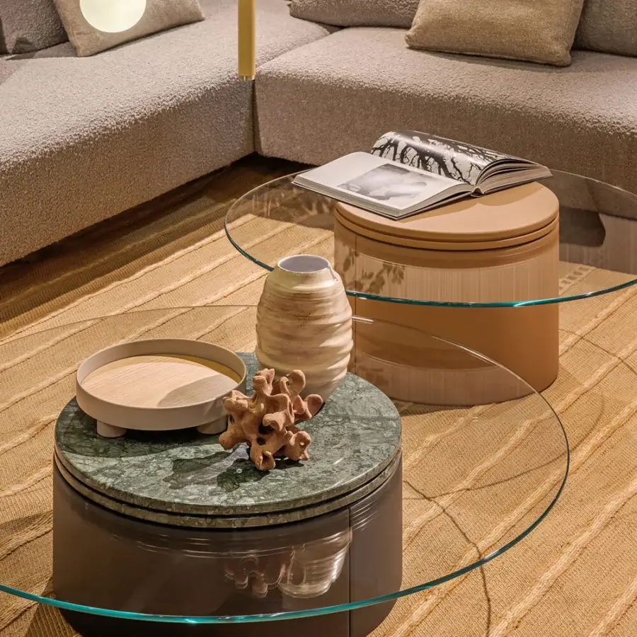 Exceptional Turri Roma coffee table with cantilevered crystal top and cylindrical bases in dark gray and light tan leather with green marble-like accent