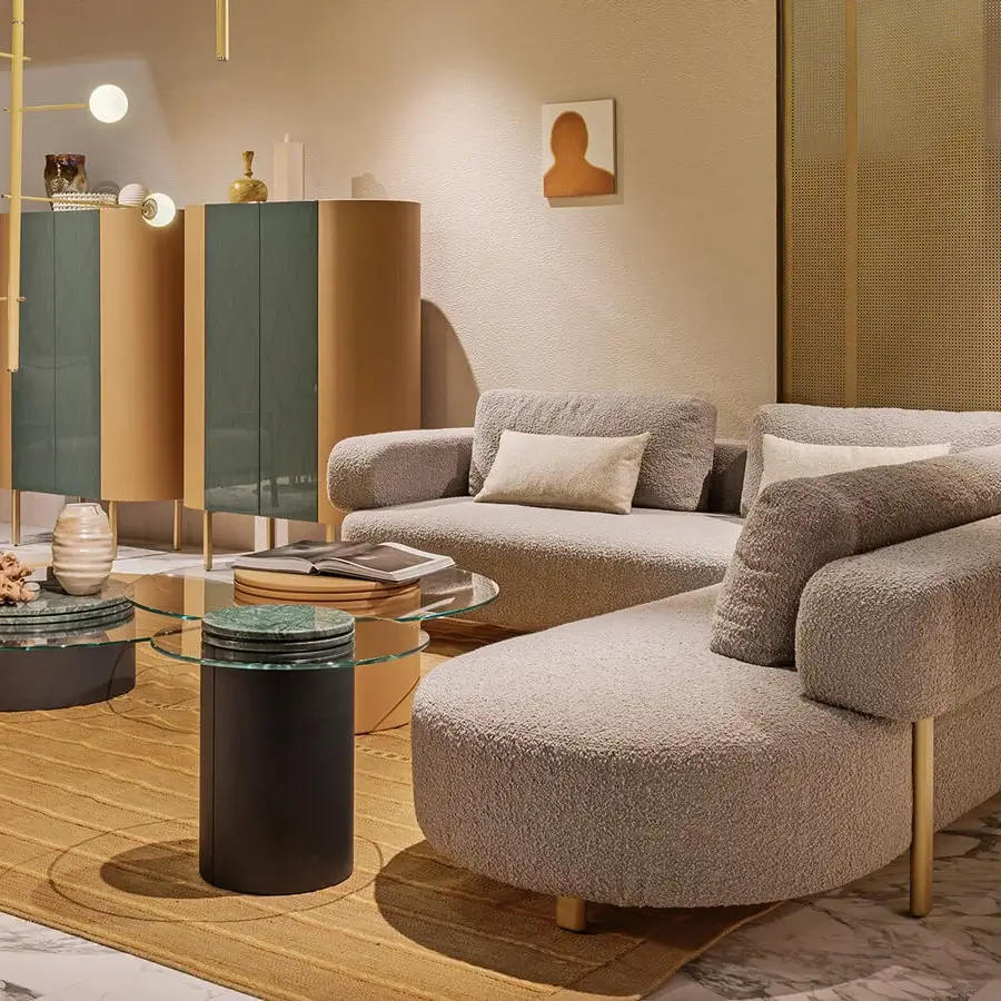 Exceptional Turri Roma sectional with generous seating, independent cushions upholstered in light grey textured fabric and champagne gold metal legs