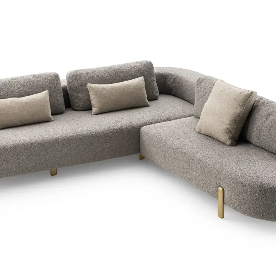 Lavish Turri Roma sectional with organic curved lines upholstered in textured gray textile and champagne gold finished metal feet