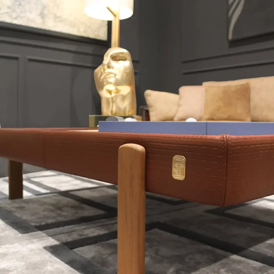 Exclusive Formitalia Kean side table with brown textured surface and gold metallic feet inserts built with a leather top frame