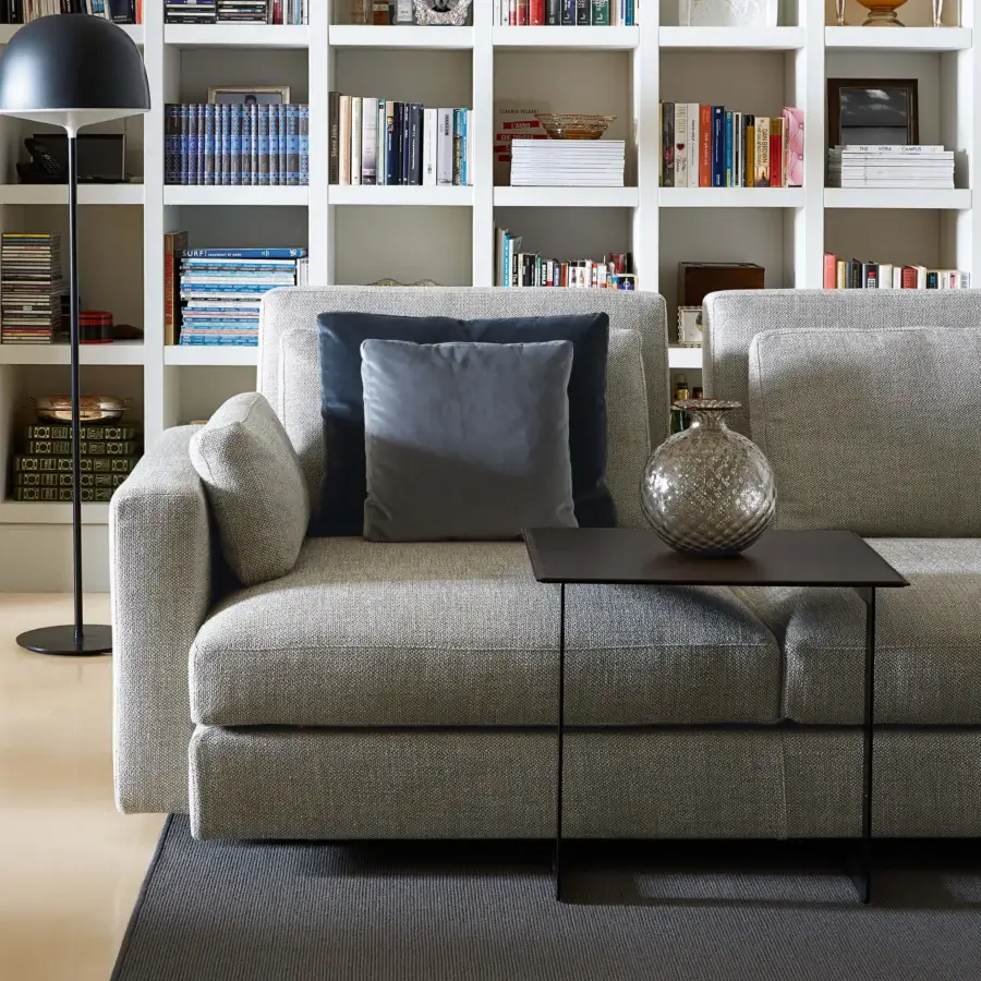 Superior Swan Italia Hemingway sectional in light gray textured textile with navy and darker gray cushions crafted in Italy