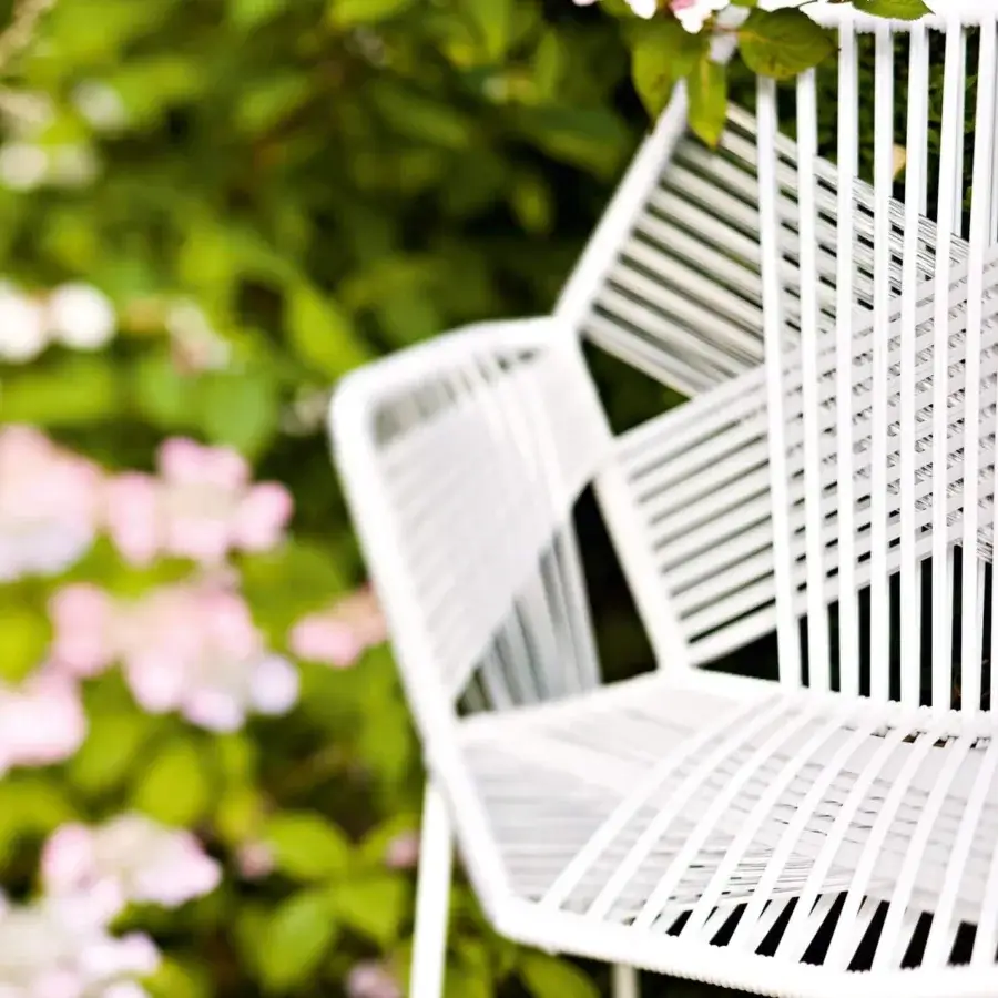 Superior Moroso Tropicalia chair with lacquered steel structure and handmade white technopolymer thread weave finish