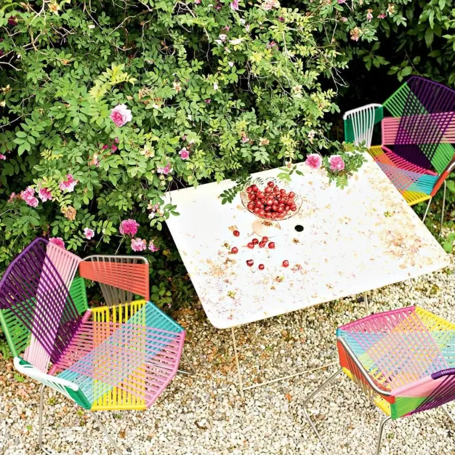 Distinguished Moroso Tropicalia chair with vibrant multicolored technopolymer weave and lacquered steel frame crafted in Italy