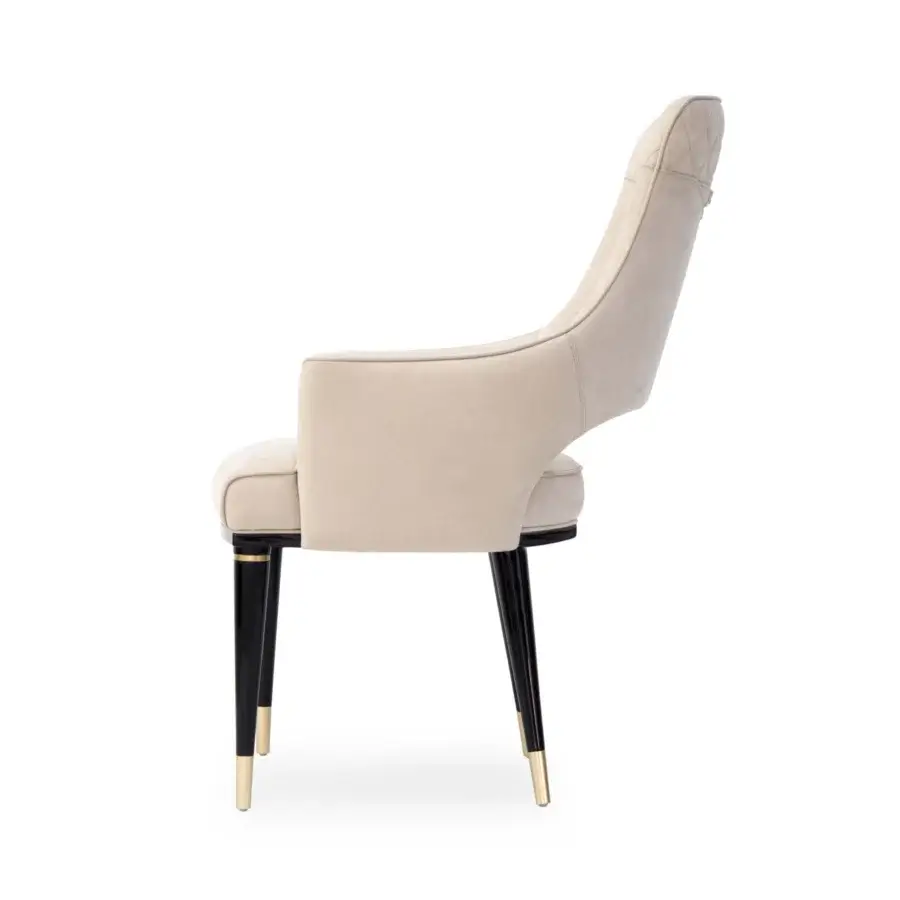 Exceptional Formitalia Dome armchair in light beige textile upholstery with quilted detailing and lacquered black legs with gold feet