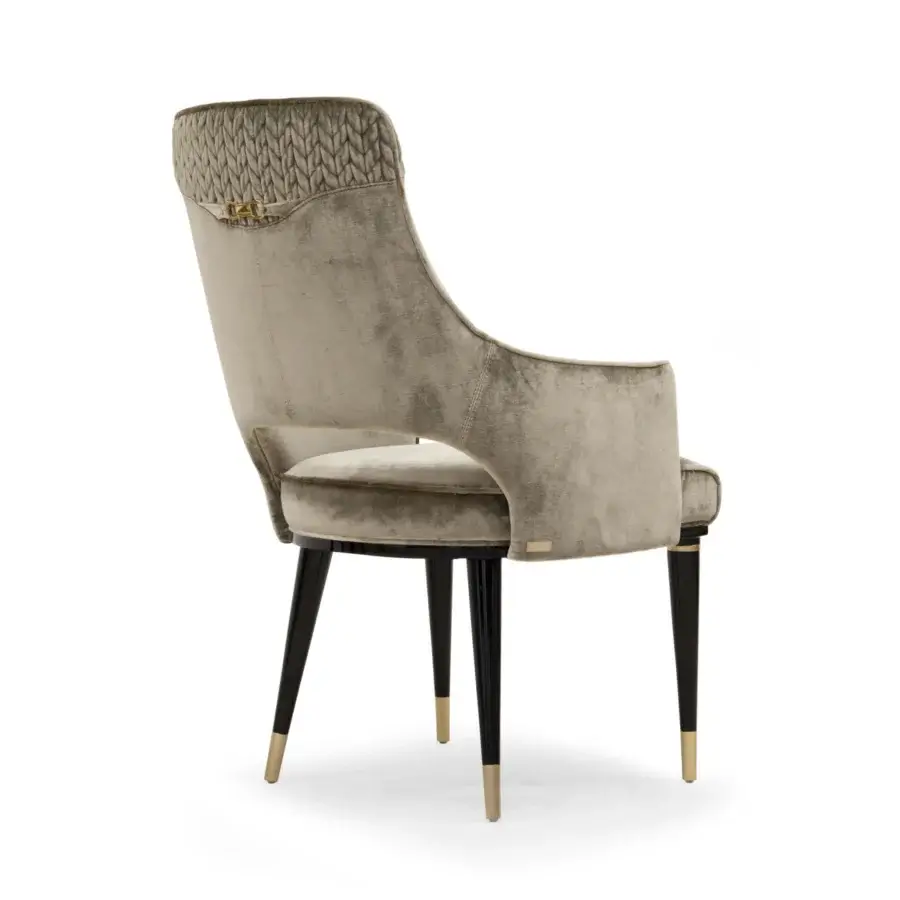 Distinguished Formitalia Dome armchair with muted taupe quilted textile upholstery and glossy dark lacquered legs with metallic feet