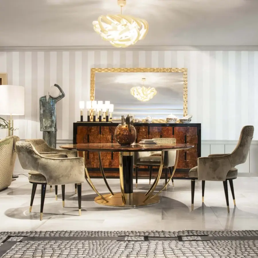 Sophisticated Formitalia Dome armchair in muted olive-green textile with glossy black lacquered legs and metallic gold accents