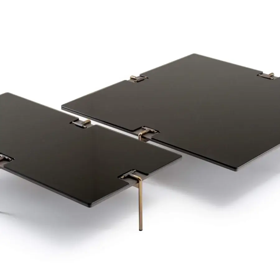Exclusive Turri Blues coffee table crafted in Italy with bronzed glass upper and dark tubular metal supports
