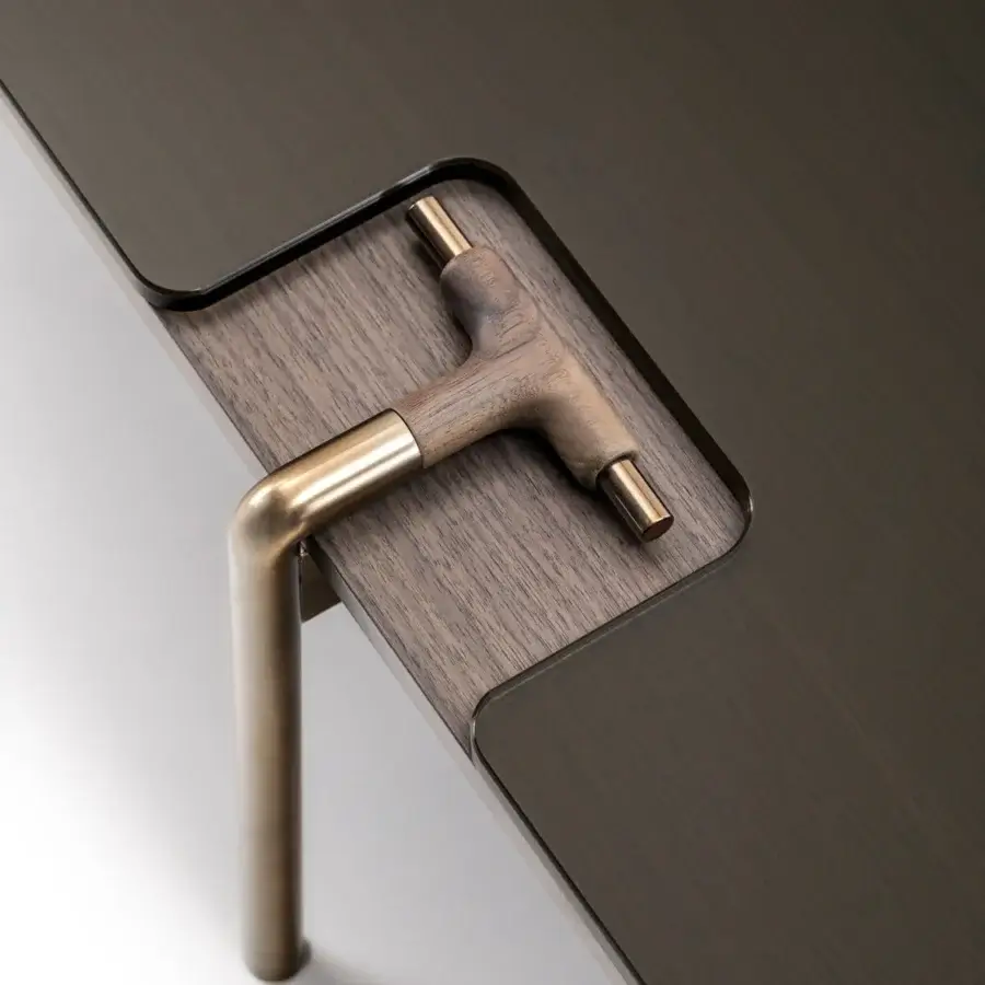 Distinguished Turri Blues coffee table with dark stained wood and brushed bronze tubular metal leg