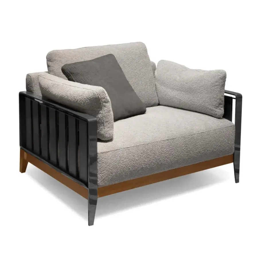 Exceptional Formitalia Daniela lounge chair with light gray textured upholstery, dark metal frame and leather armrest straps
