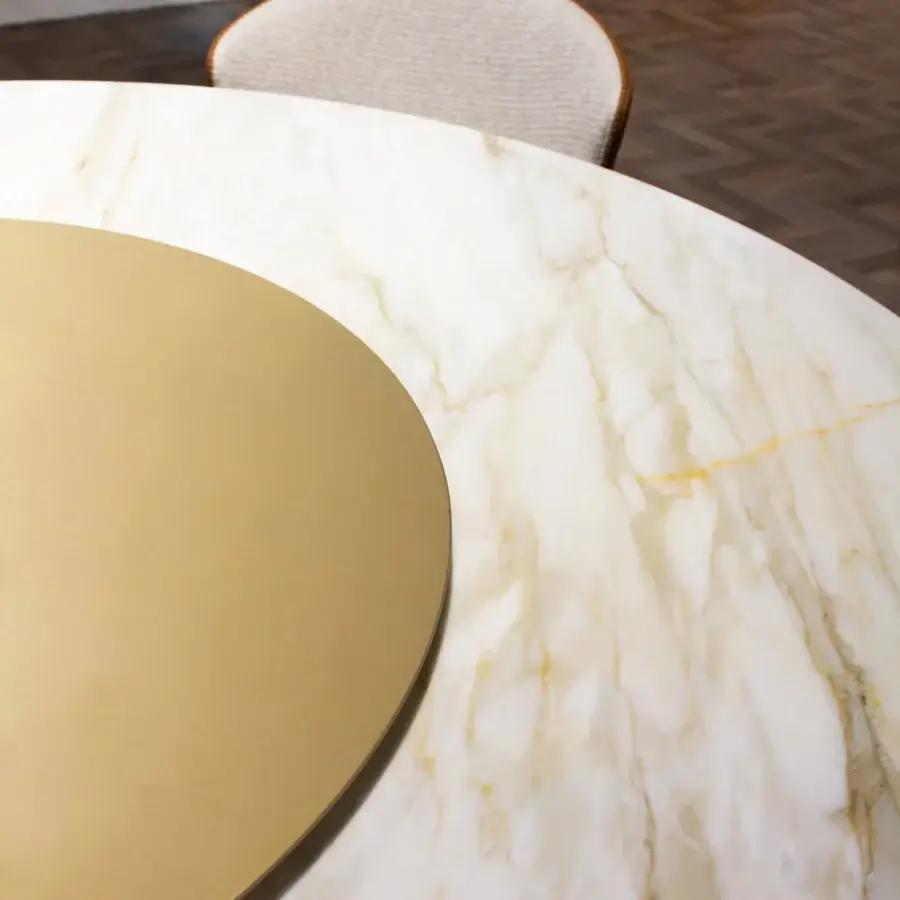 Lavish Formitalia Iside table with swirling white and pale gold marble top and leather covering with matte gold metal details