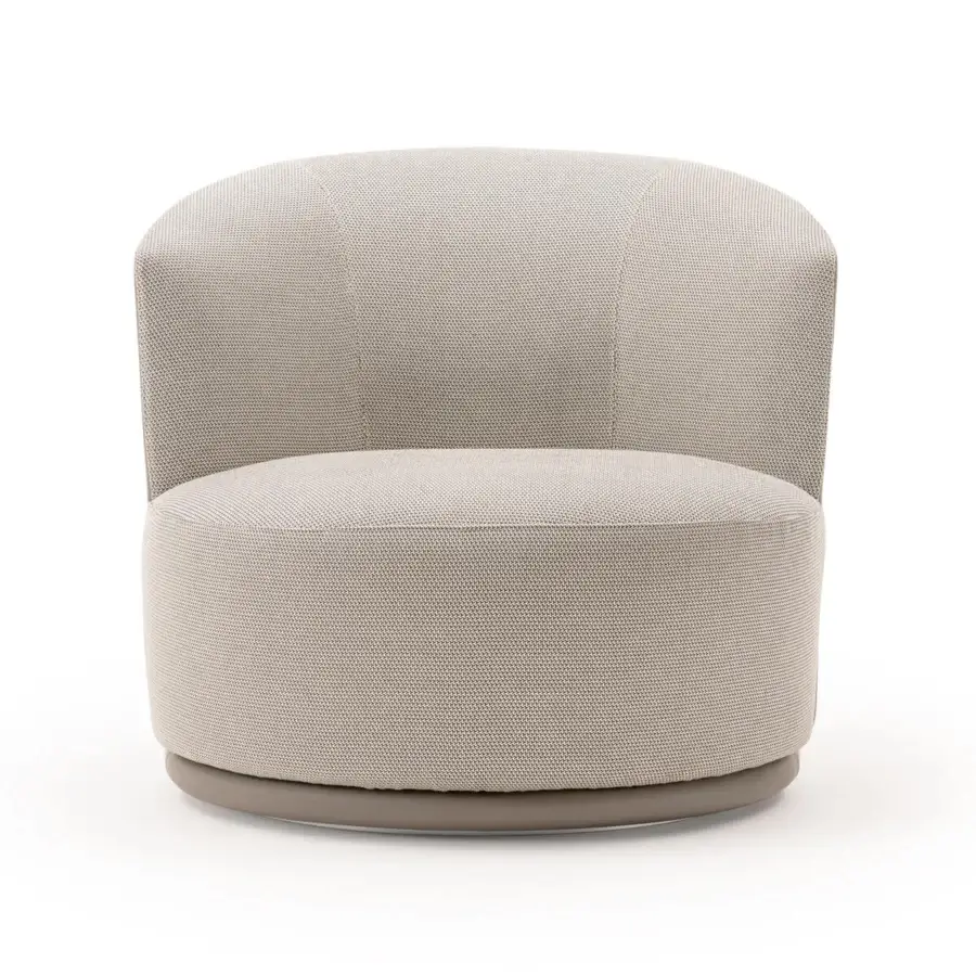 Sophisticated Turri Blues lounge chair upholstered in light beige woven fabric with a matte tone base