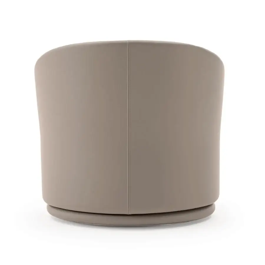 Distinguished Turri Blues lounge chair upholstered in light grayish-brown fabric with a matte finish and seamless rounded form