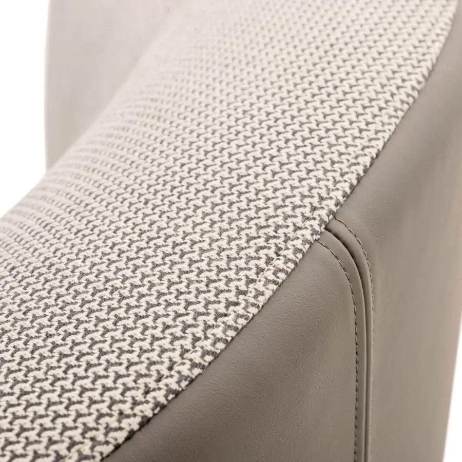 Superior Turri Blues lounge chair with bi-color upholstery in patterned gray textile and matte gray leather build