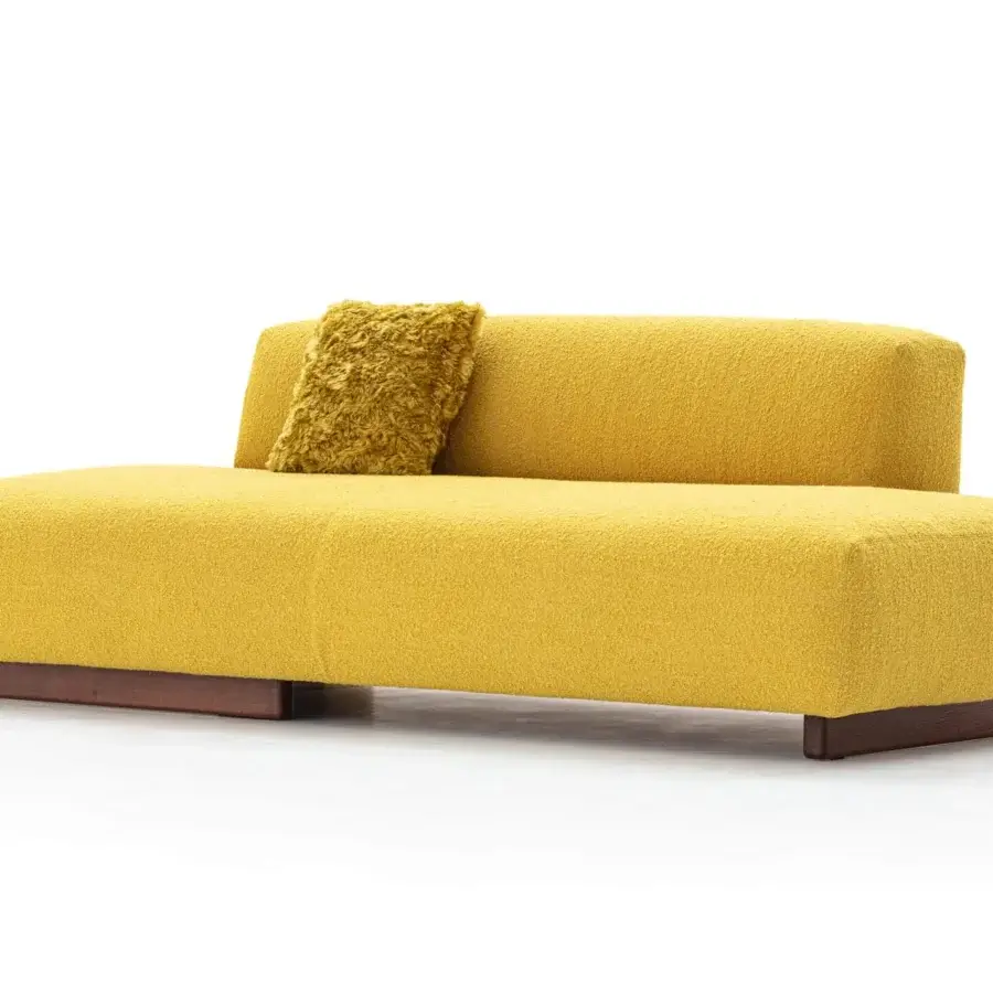 Distinguished Moroso Loveland sofa in textured yellow textile with ash wood varnished feet and tubular steel runners