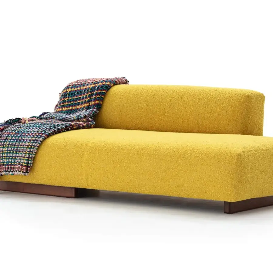 Distinguished Moroso Loveland sofa in vibrant yellow textile with textured finish and dark varnished ash wood base