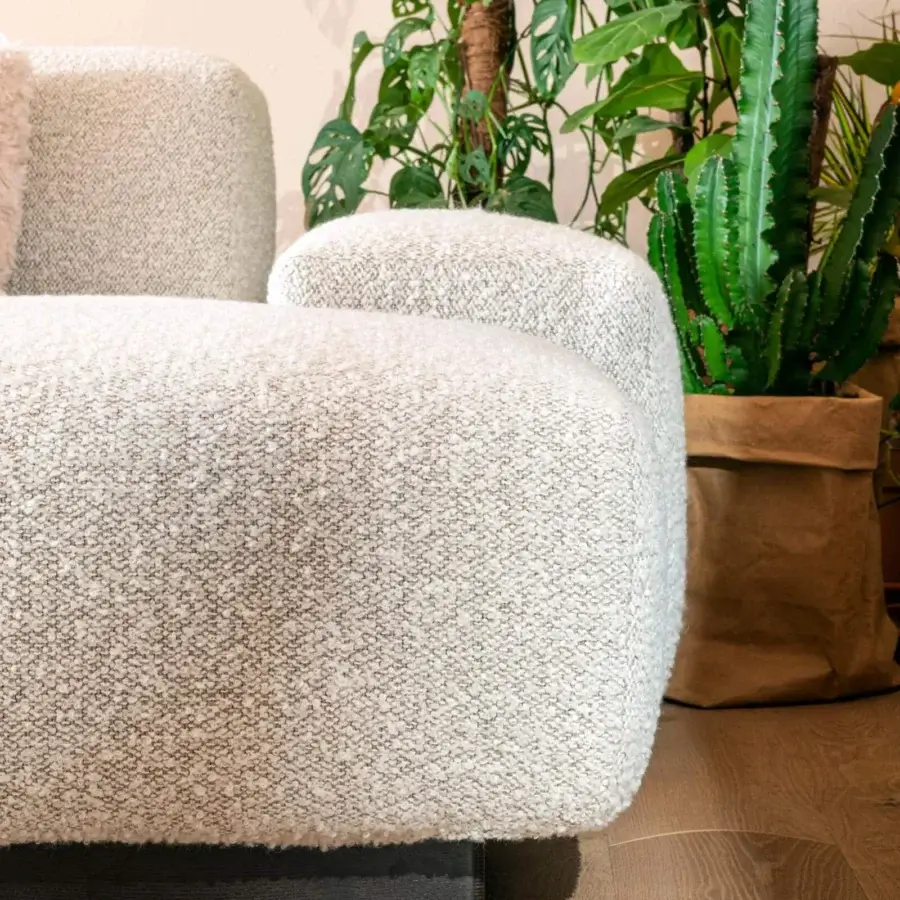 Lavish Moroso Loveland sectional upholstered in light textured boucle with tubular steel runners and varnished ash wood feet