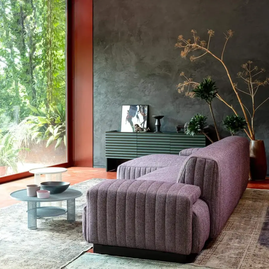 Superior Moroso Loveland sectional in muted lavender with quilted fabric and varnished ash wood feet