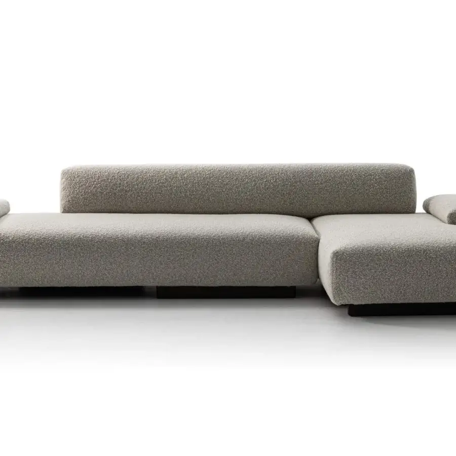 Superior Moroso Loveland sectional in light gray textured textile with ash wood varnished feet and quilting