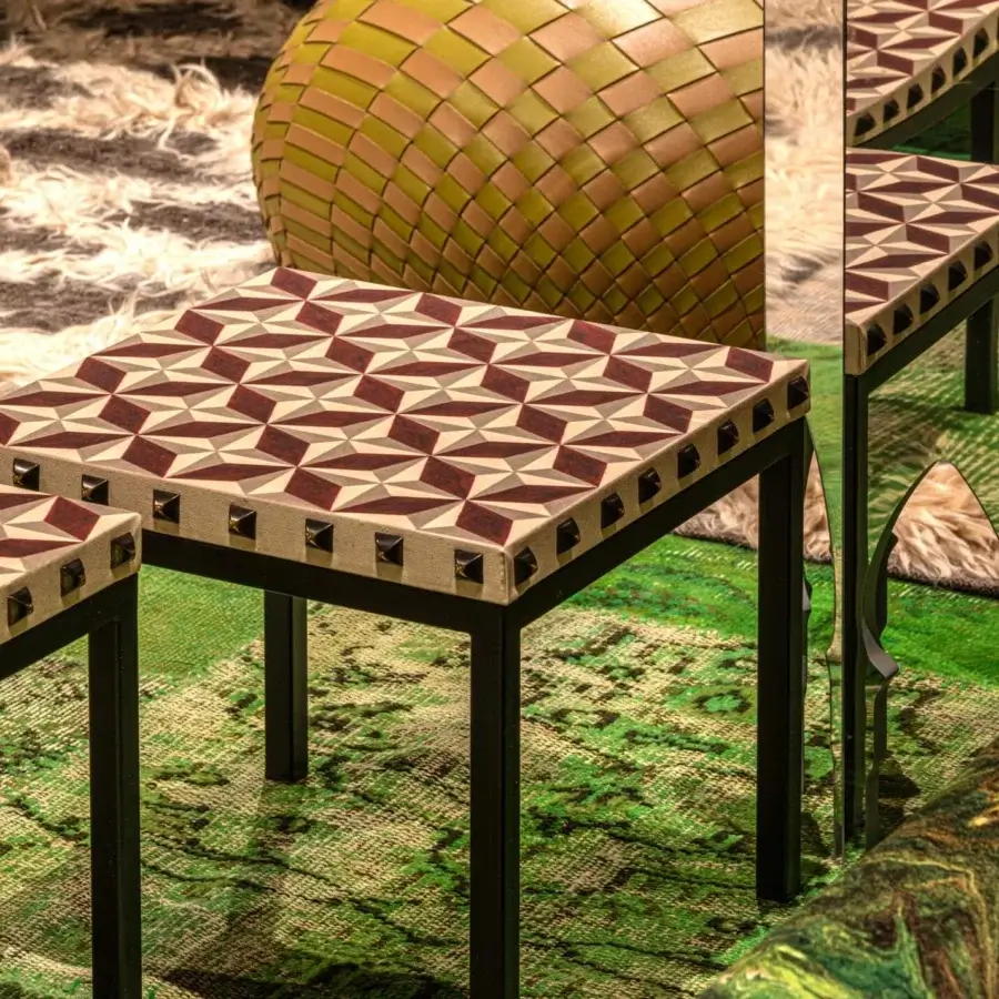 Elegant Moroso Salon Nanà coffee table in light beige and burgundy with printed cotton canvas and dark steel studs