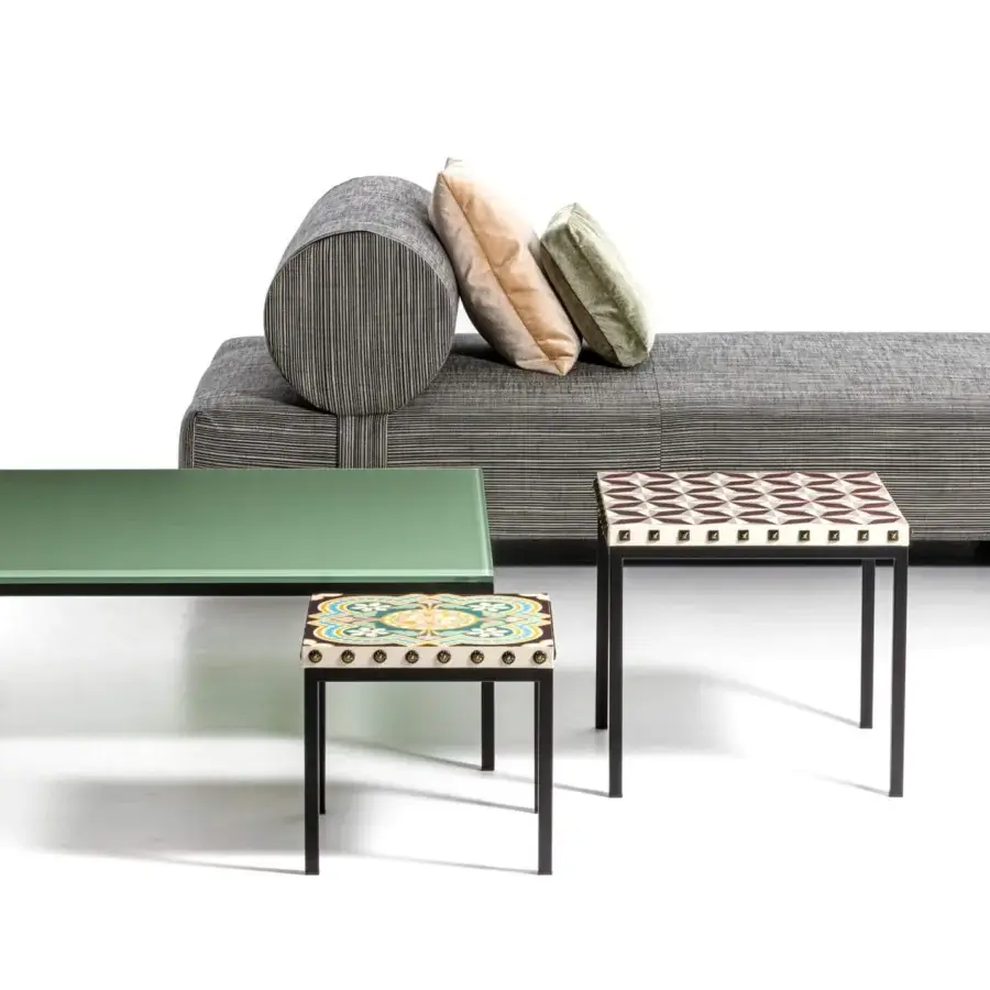Elegant Moroso Salon Nanà coffee table with polished laminated glass top and powder coat steel base in RAL 9005