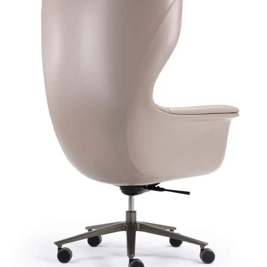 Exceptional Turri Blues armchair with enveloping high backrest upholstered in smooth light beige synthetic material with dark matte base