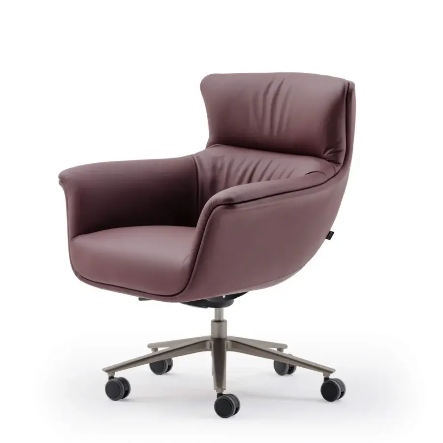 Distinguished Turri Blues armchair with ergonomic seat upholstered in supple Italian leather and mauve finish