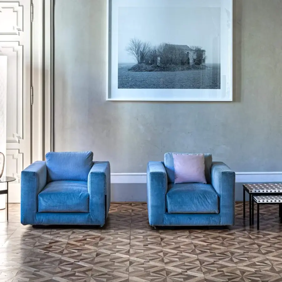 Superior Moroso Salon Nanà lounge chair with blue corduroy textile and beech wood structure