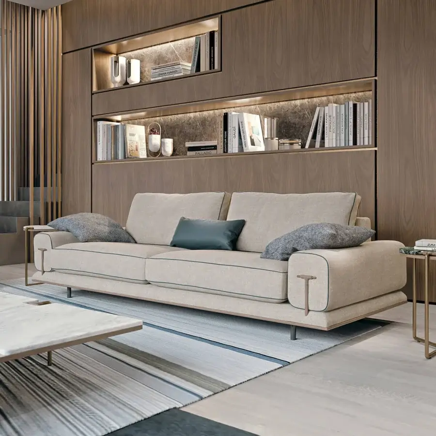 Exclusive Turri Blues sofa with light beige textile and subtle blue-green piping, built with a linear walnut wood base and tubular metal legs