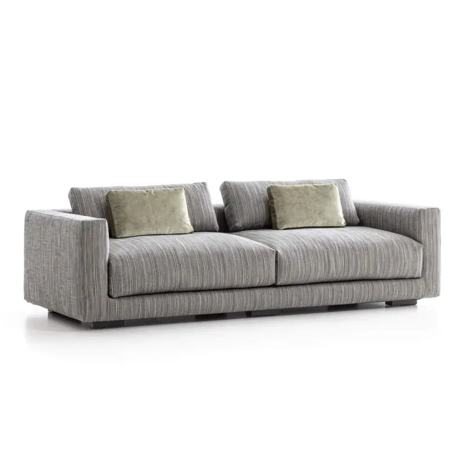 Moroso Nanà sofa, gray striped fabric, three-seater with square armrests and olive-green velvet pillows, studio shot.