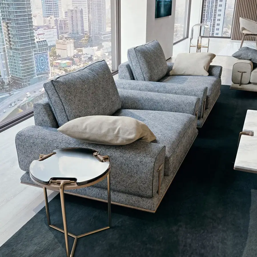 Exceptional Turri Blues lounge chair upholstered in textured gray fabric with Canaletto walnut accents