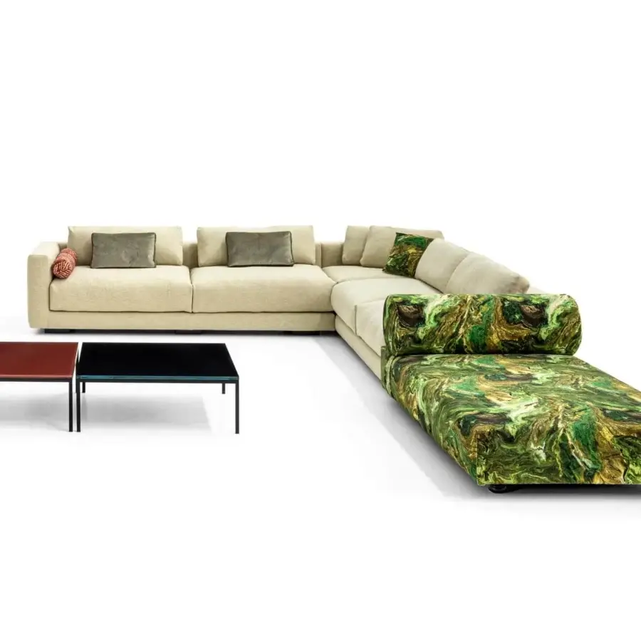 Lavish Moroso Salon Nanà sectional with light beige textile, goose feather cushions and a green patterned chaise lounge built on a beech wood structure