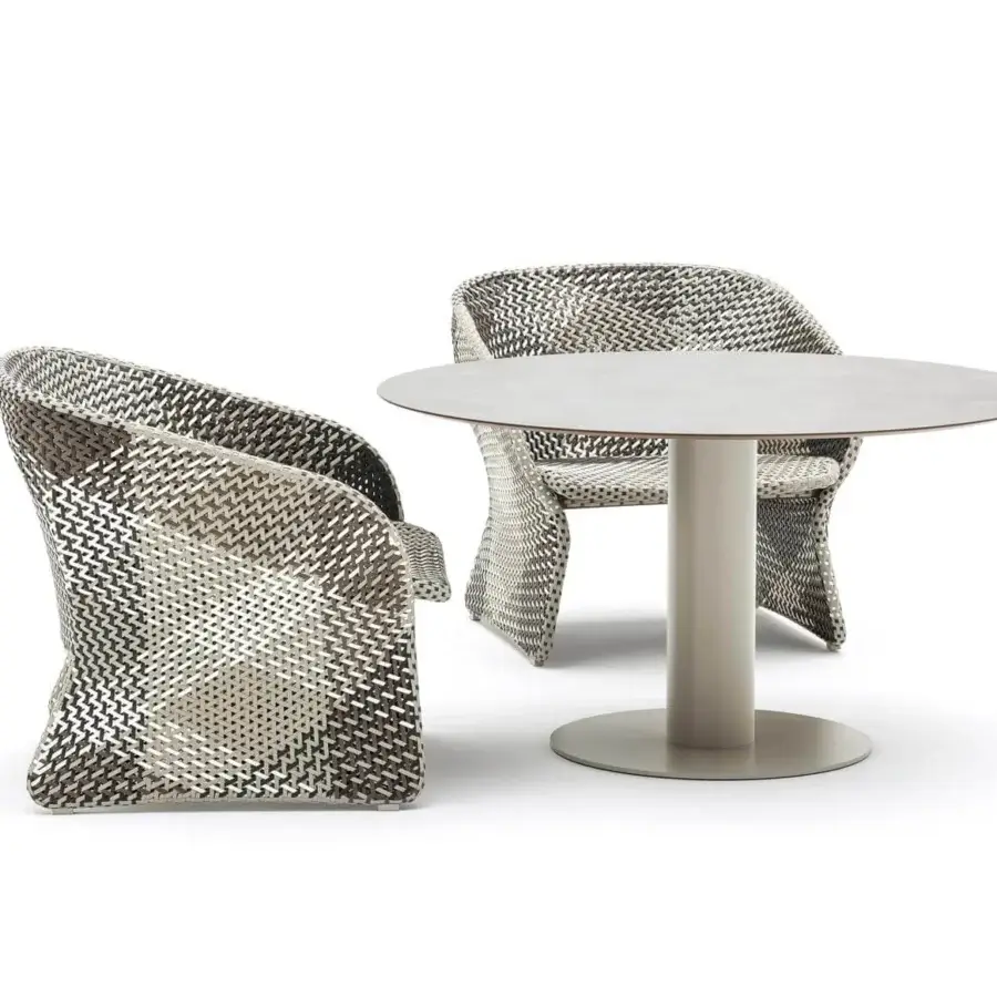 Elegant Varaschin Maat lounge chair with hand-woven mixed tones and powder-coated aluminum frame crafted for outdoor comfort