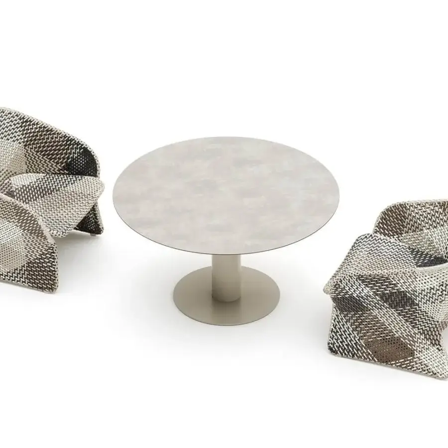 Distinguished Varaschin Maat lounge chair crafted in synthetic fiber with a powder-coated aluminum frame exhibiting a complex woven texture