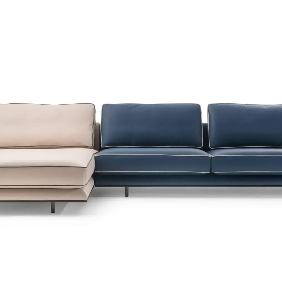 Distinguished Turri Blues sectional with a beige chaise and dark blue sofa, built with walnut wood and T-shaped metal legs