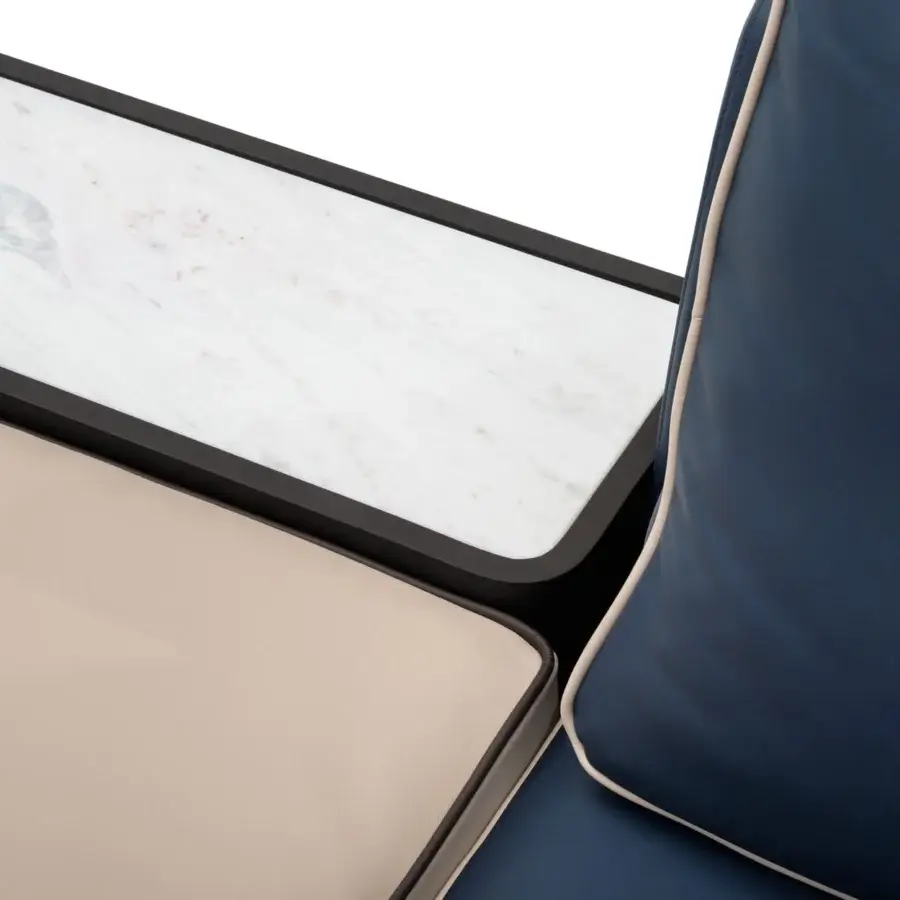 Lavish Turri Blues sectional with dark blue leather upholstery, walnut wood base and integrated white marble-like surface