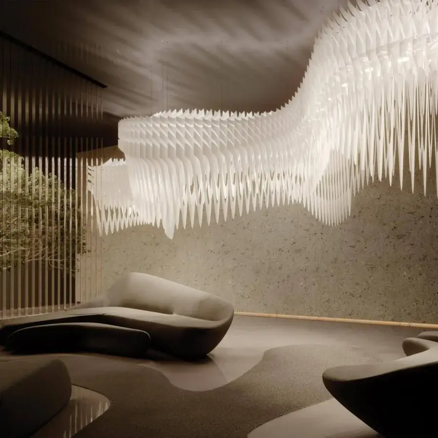 Superior Slamp Aria Infinita suspension lamp in undulating layers of white Lentiflex® polycarbonate with uniform finish
